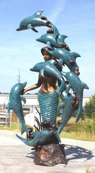 Life size mermaid with eight dolphins bronze sculpture underwater realm